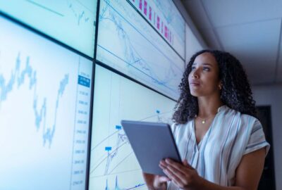 uk-york-businesswoman-with-tablet-looking-at-cha-2024-10-18-08-37-09-utc (1) (1)